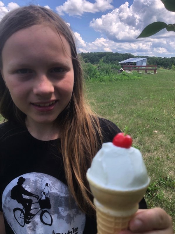  a cherry from our little cherry tree on some Cosmic Cream softserve! 