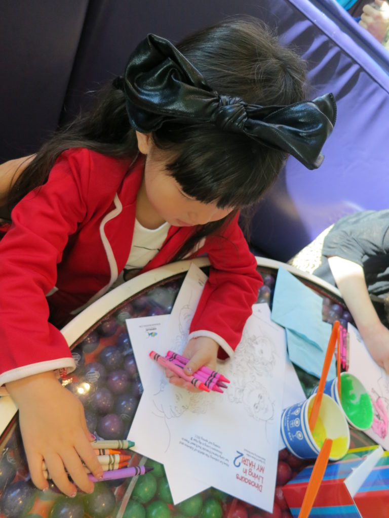 She also enjoyed coloring the illustrations from the book and even happily showed the author her masterpiece when she finished.
