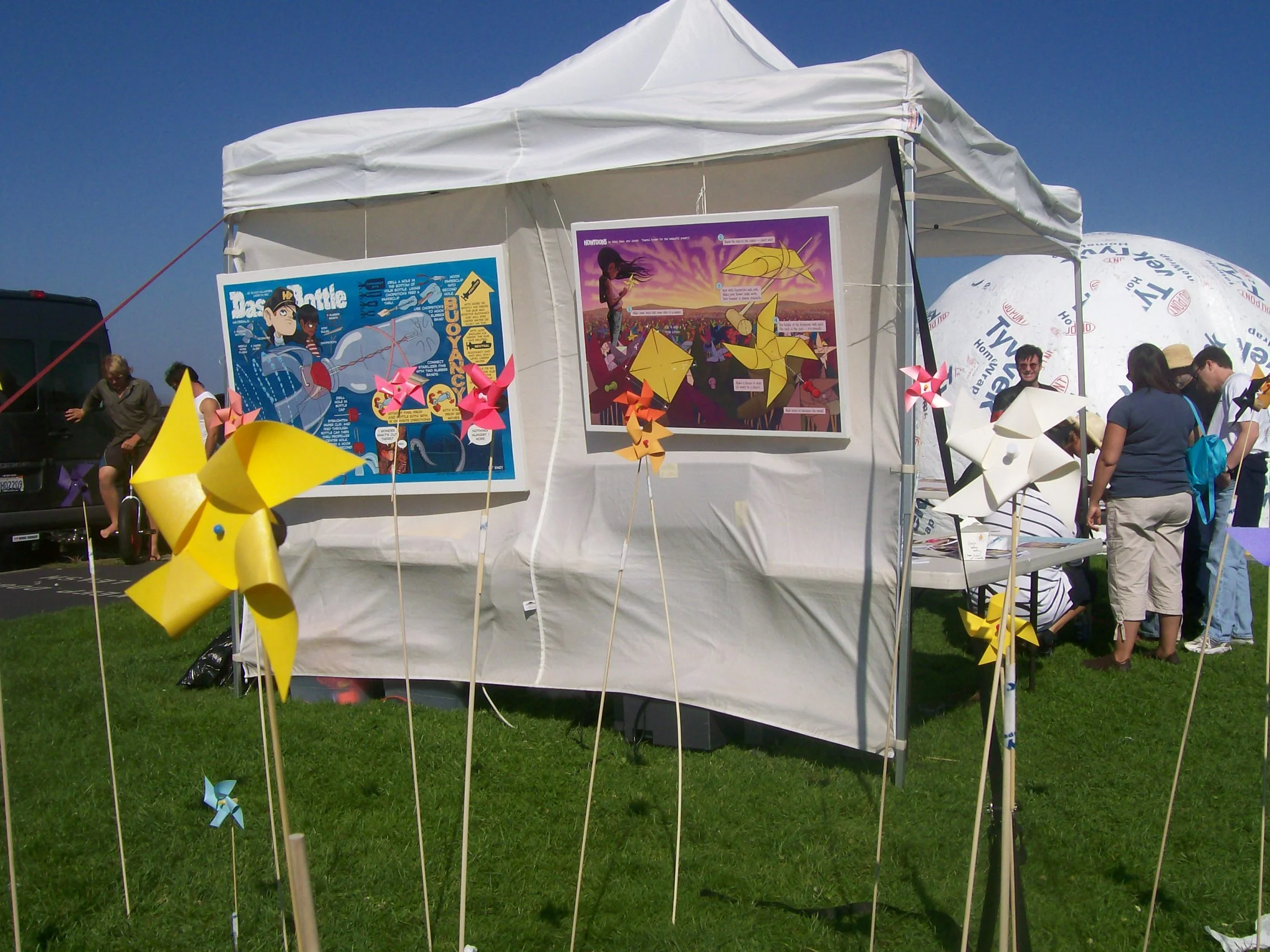  At the   Howtoons &nbsp; booth, children constructed pinwheels, which demonstrate the basic physics of wind turbines. Some planted their pinwheels to create a colorful whirling garden. 