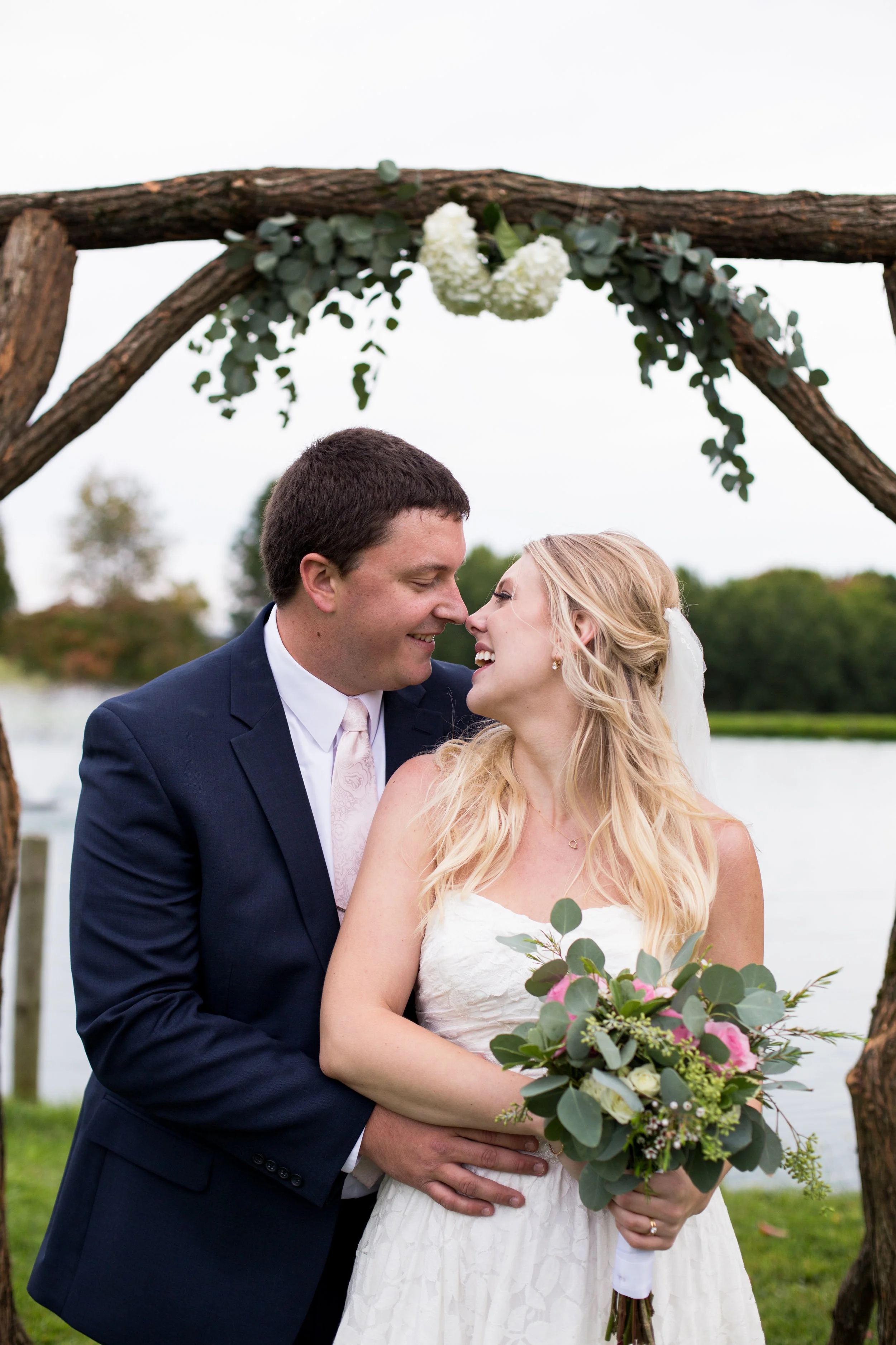 "Ashley photographed our October wedding and she is phenomenal! Both Collin and I can be awkward in front of the camera but she made us feel so comfortable and at ease. We absolutely love our photos! We highly recommend her!!" - Hallie Manelick