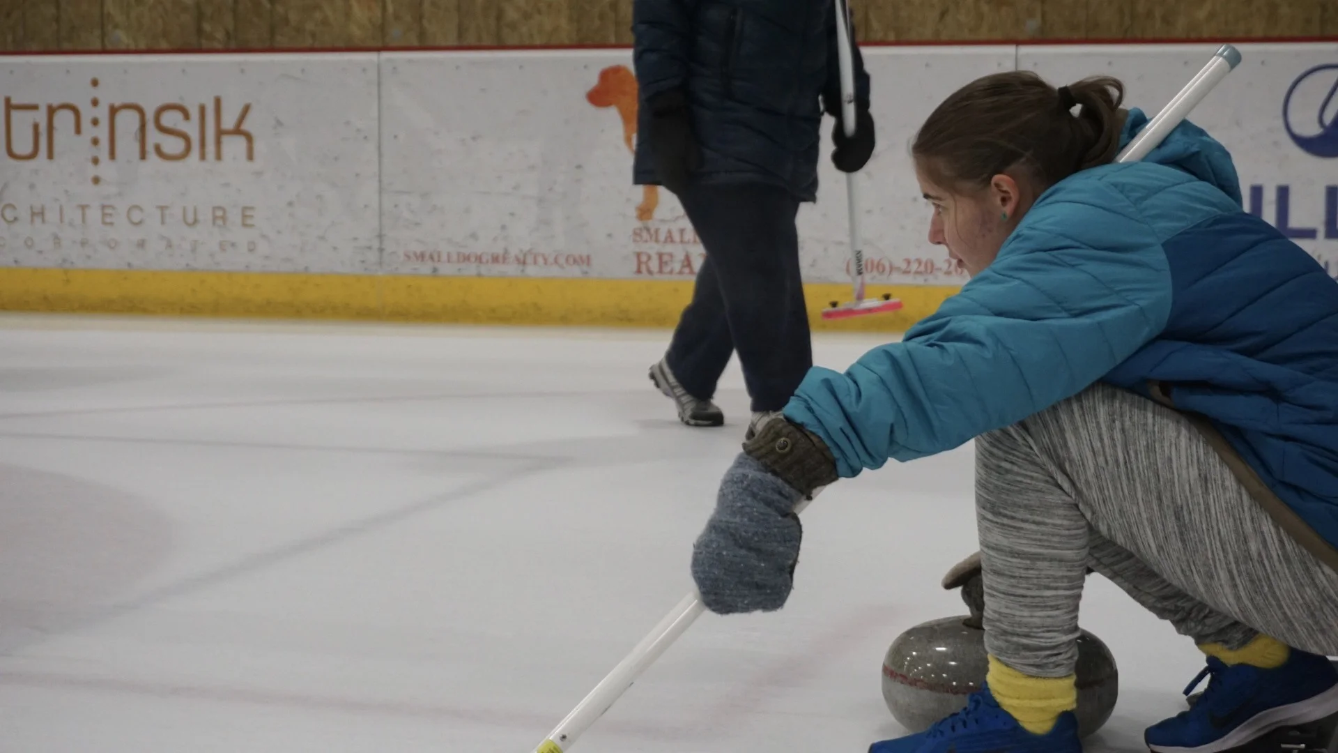 Bekah getting her curling game face on with the Bozeman Curling Club.