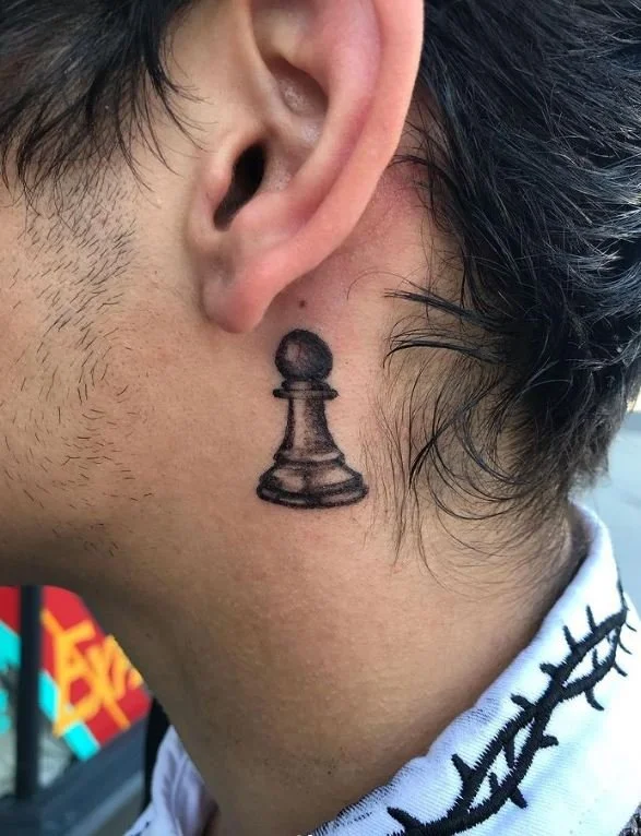 west_chess_piece_ear_neck_blackandgrey_object_item_rabblerousertattoo_losangeles.jpg