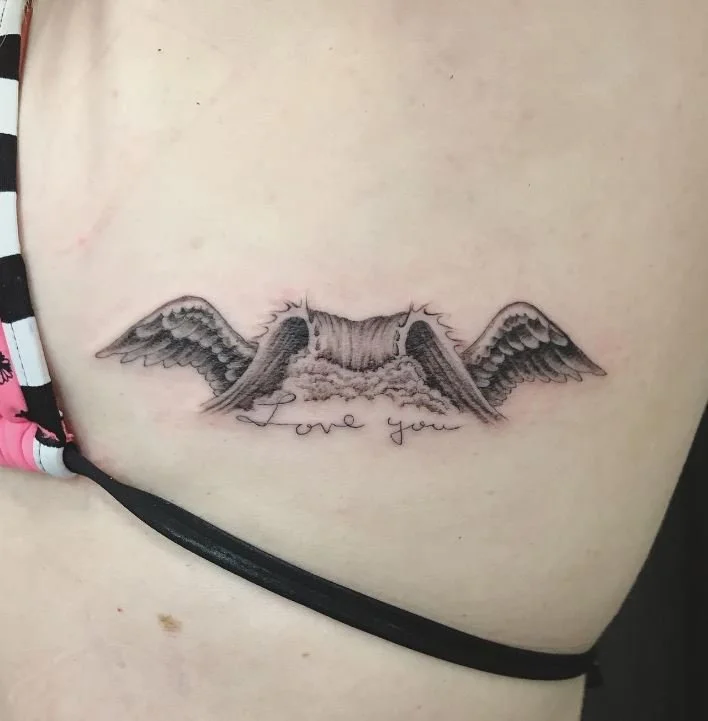 west_fineline_shading_blackandgrey_lettering_wings_waves_rabblerousertattoo_losangeles.jpg