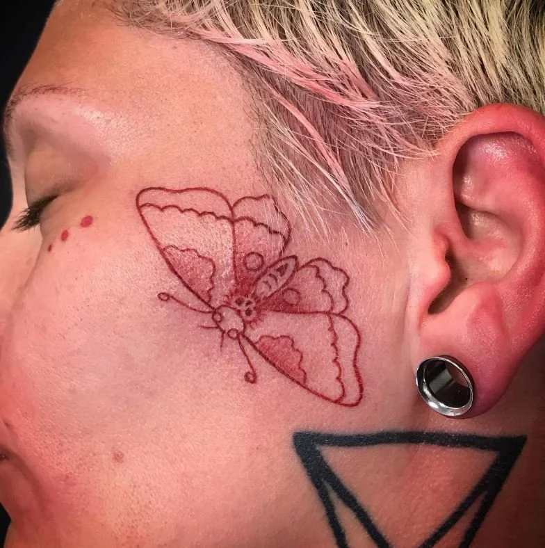 west_animal_bug_moth_red_color_lines_minimalist_face_rabblerousertattoo_losangeles.jpg