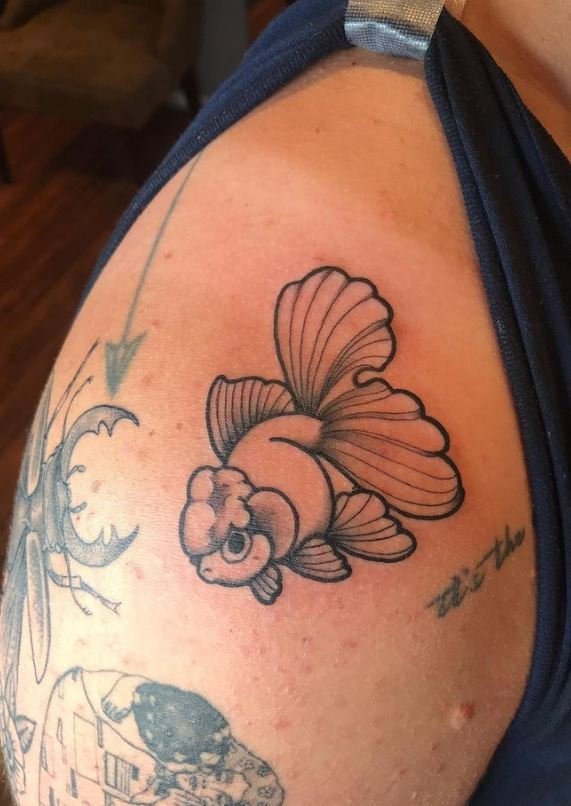 west_animal_fish_lines_thigh_rabblerousertattoo_losangeles.jpg