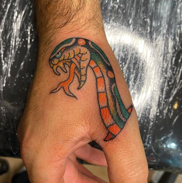 cummings snake head traditional fangs reptile.JPG