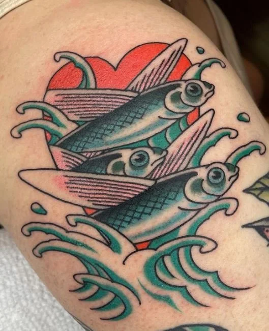 young flying fish wave.JPG