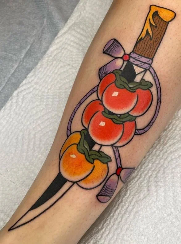 young fruit stab persimmon knife tassle.JPG