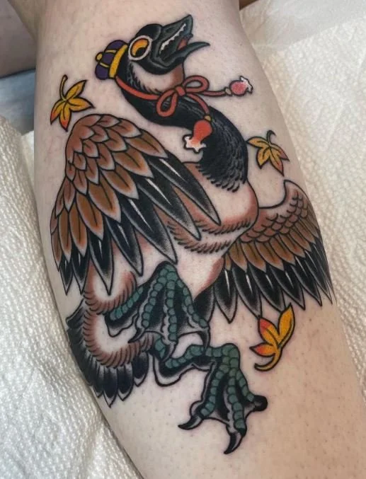 young goose maple leaf animal bird royal hat.JPG