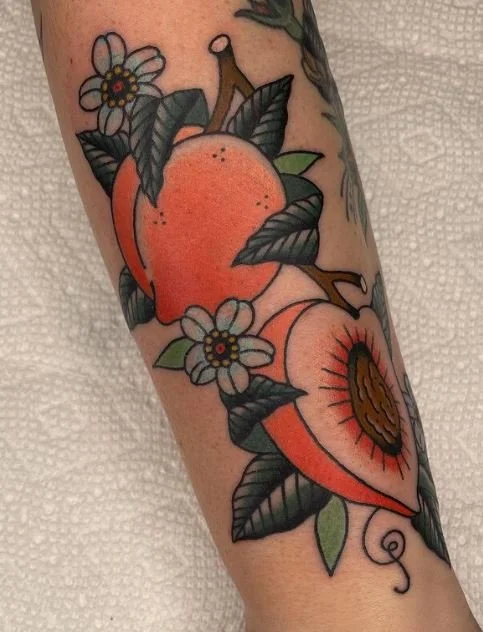 young peaches peach fruit blossom flower stem.JPG