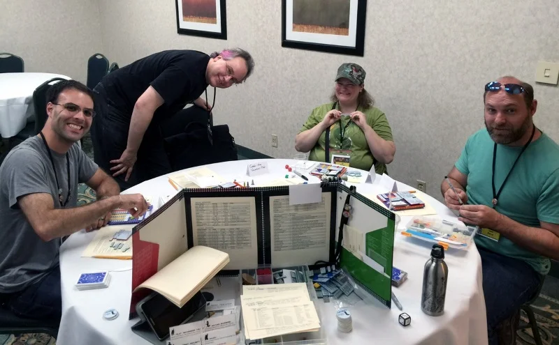The crew of the Golden Can: Joe, Wilhelm, Liz, and Jason