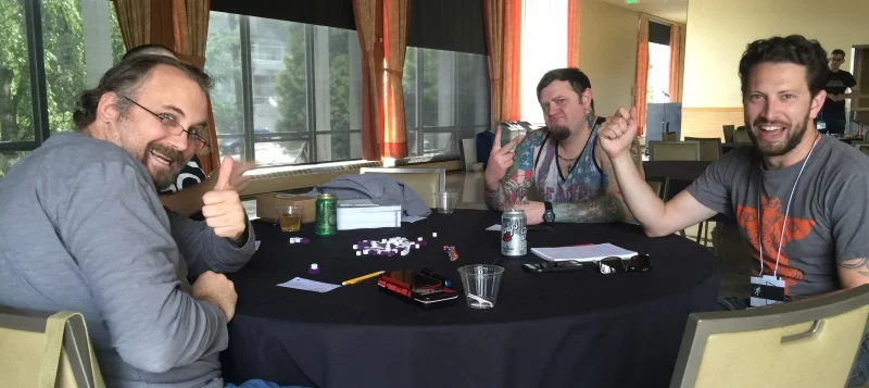 Jerry, Jim's blurry middle finger, Nate, and Derek as carnies.