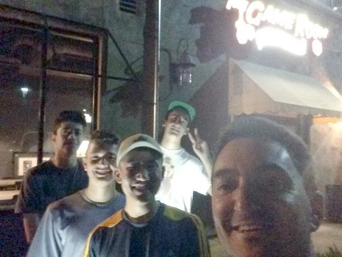 A somewhat crappy photo at night in front of the cafe with my Dungeon World players.