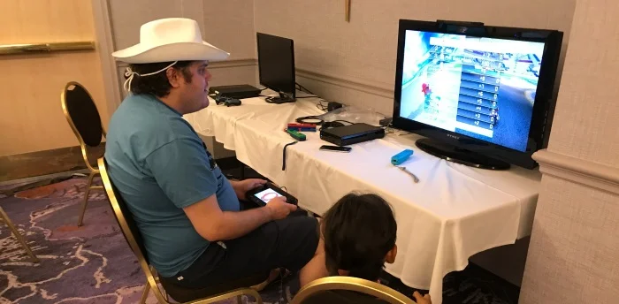 Mario Kart action in the little video game room.
