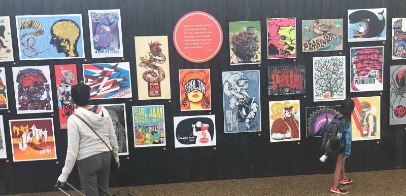 The Pearl Jam poster wall at the airport.
