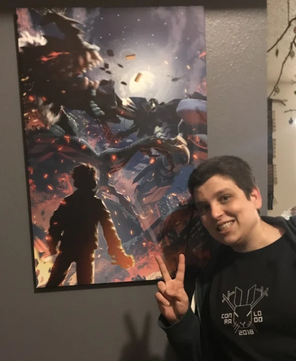 The man next to the seminal poster. 