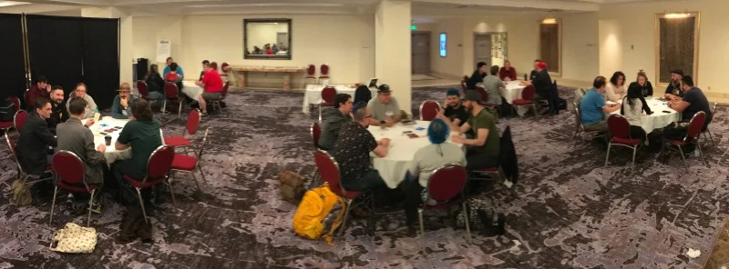 A panoramic of the For The Queen tables