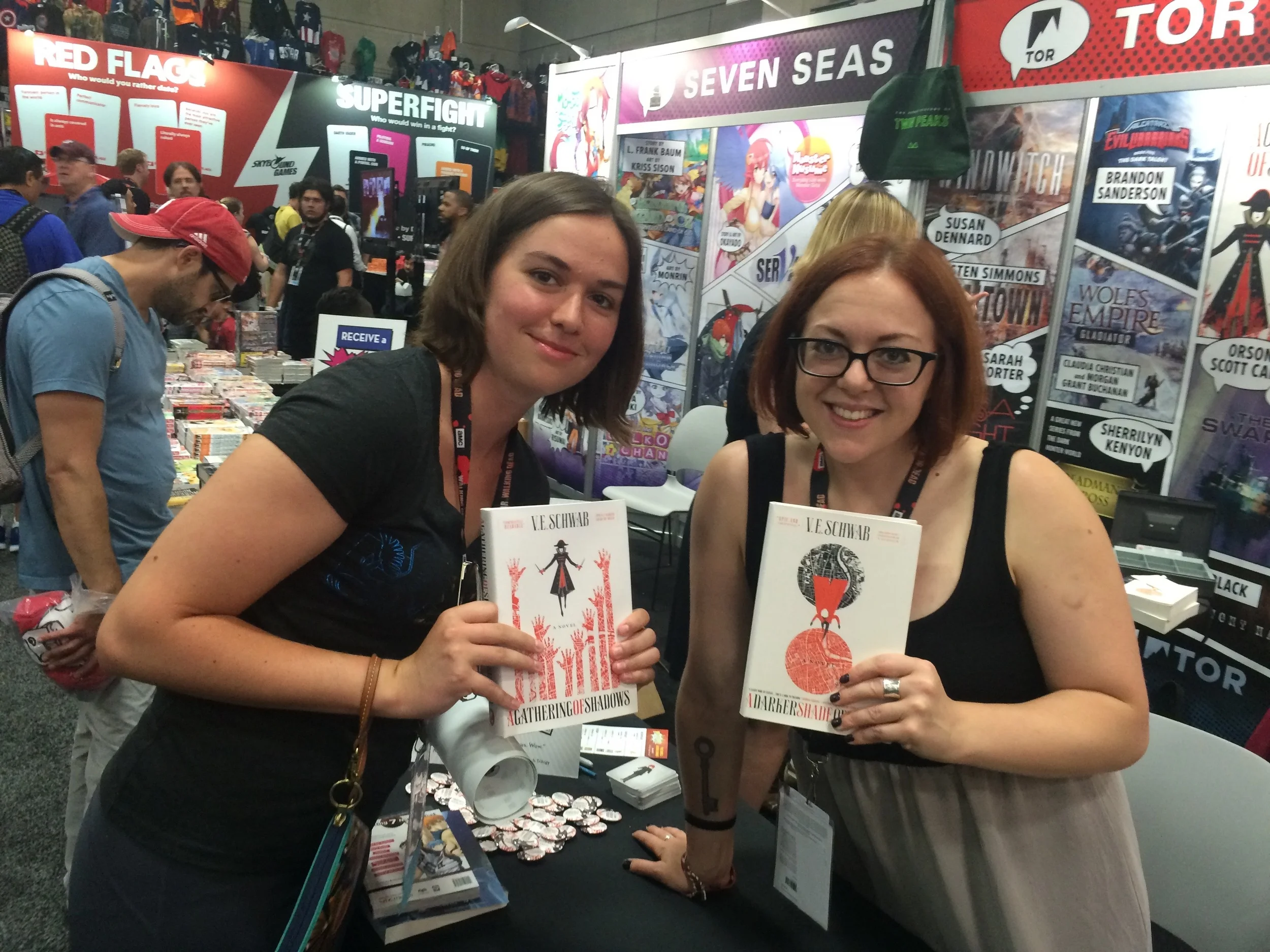 I met Victoria Schwab. Accidentally. I feel like I should say that I planned SDCC down to a t, but the truth is that I stumbled across a lot of cool stuff. I ran into my friend Jillian in line for a free copy of Vicious at the Tor booth, and I joined her, planning to buy hardbacks of her A Darker Shade of Magic series. I thanked her for a writing a great (and inspiring) blog post about not giving up as she signed both my new books. It's always nice find that a skilled author is friendly too, even when they're swamped with people expecting free stuff. Speaking of free stuff, I also ran into Leigh Bardugo, author of the Grisha trilogy and ix of Crows! Also, accidentally. As Jillian and I walked away from the Tor booth and wandered down an aisle, I recognized her. I stopped. (It's official, I have a crush). Jillian stopped. We booth decided to get in line, even though we had nothing to sign, because it's Leigh Bardugo, and we're here, and she's here, so... We got free posters and Crooked Kingdom samplers, which Bardugo signed as I attempted to low-key, super casual, like we're friends. Whatever. 