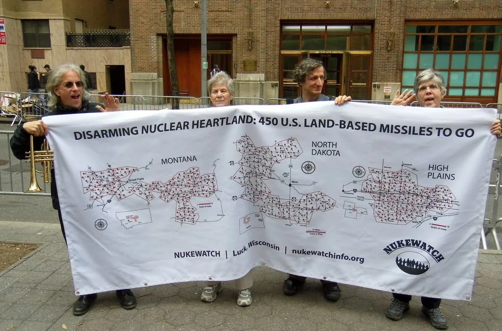 Peace& Planet Rally participants wave goodbye to nuclear weapons, Manhattan, NY.