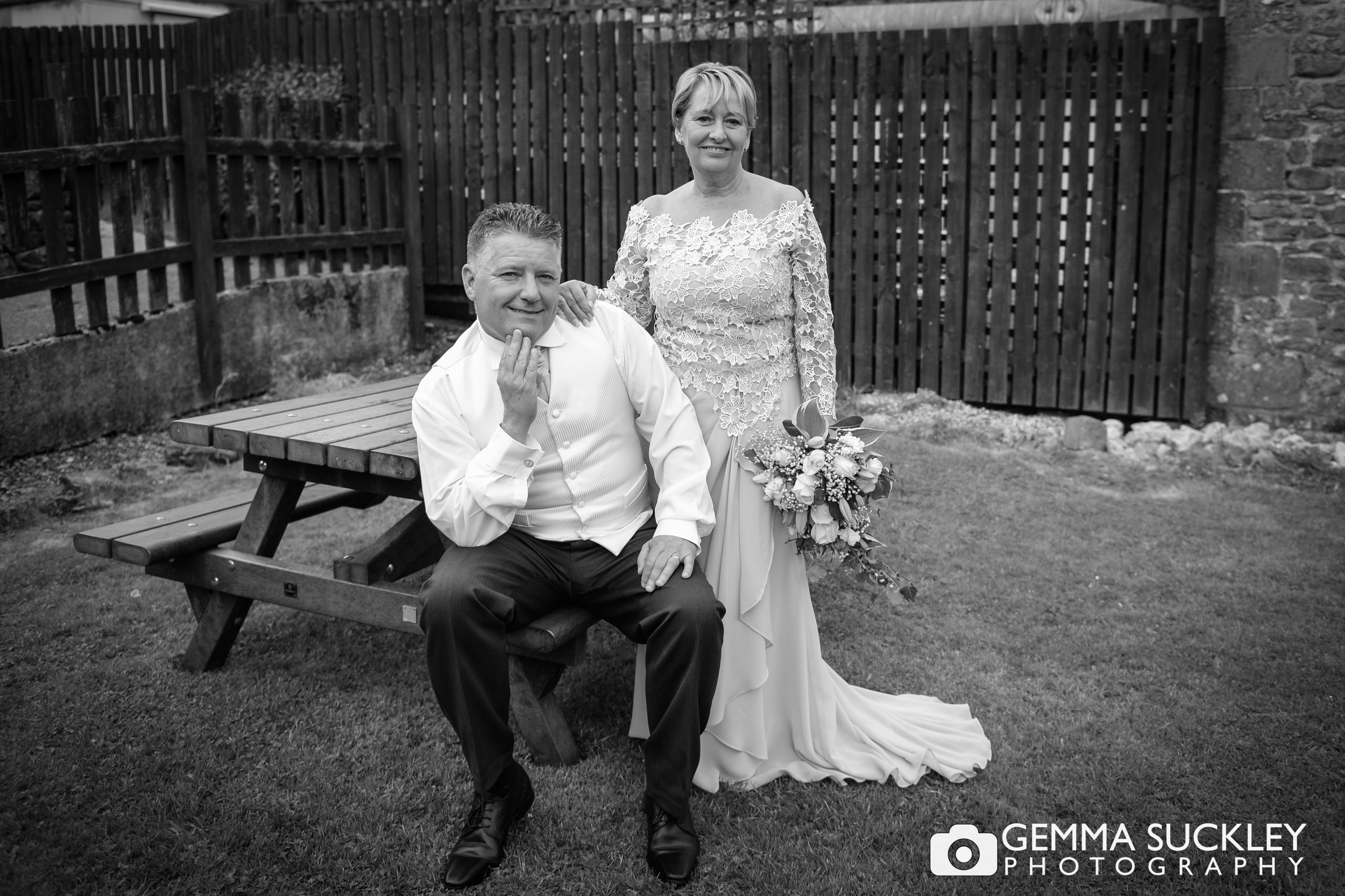 bride and groom at in the Gameskeeper Inn garden