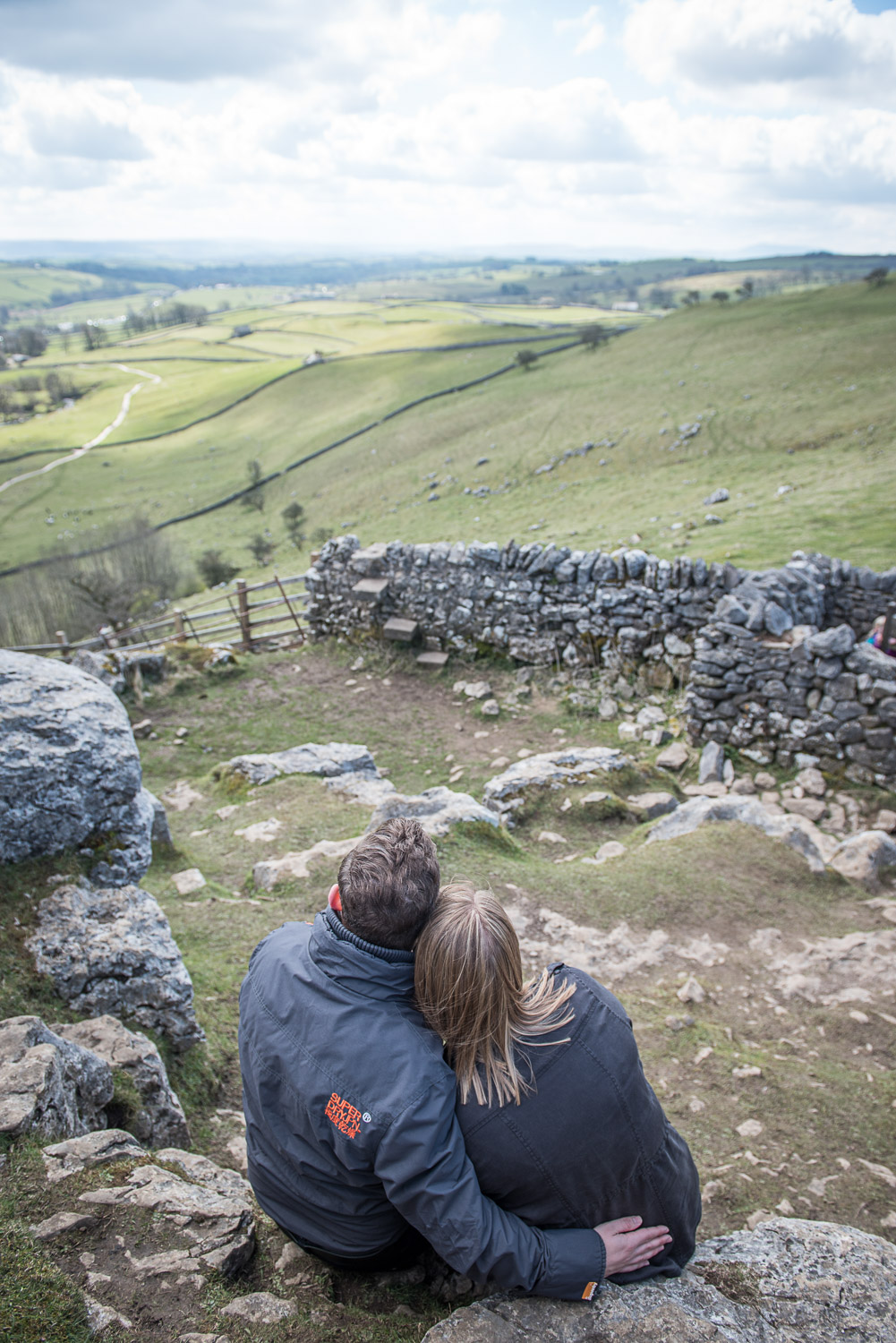 bride and groom to be looking at the view on Malham