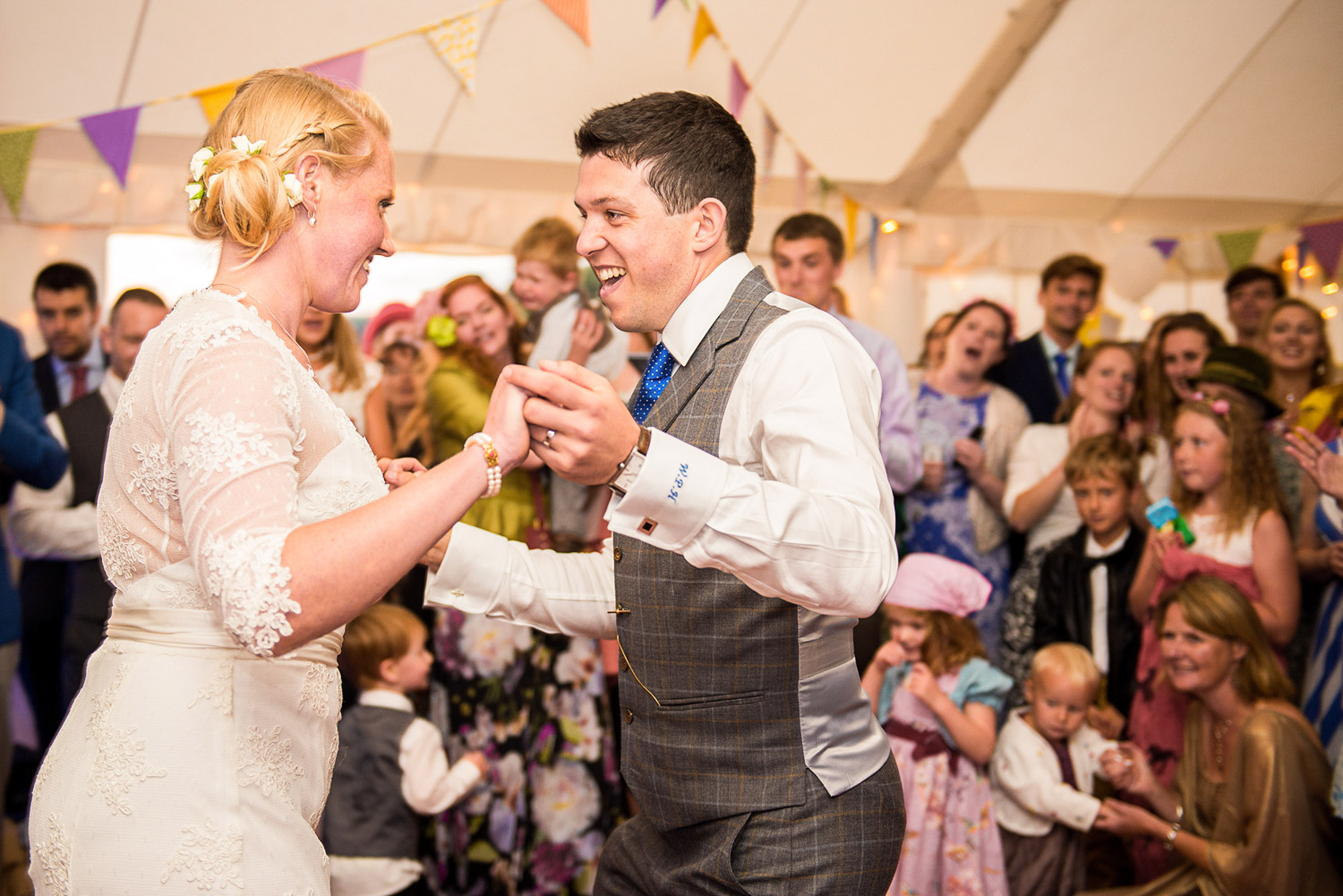 bride and groom doing their first dance at their marquee wedding