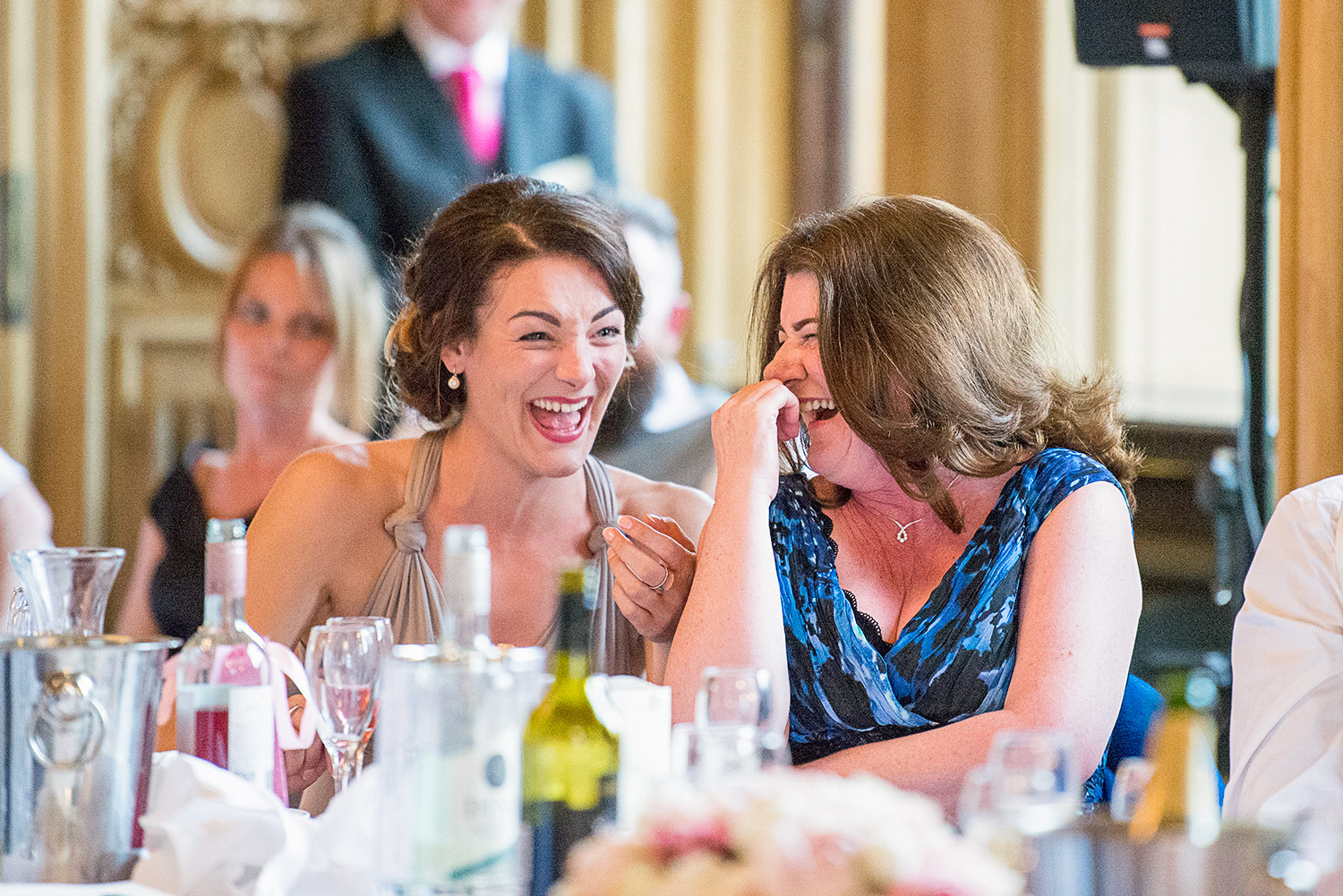 weddings guest laughing at best man's speech   