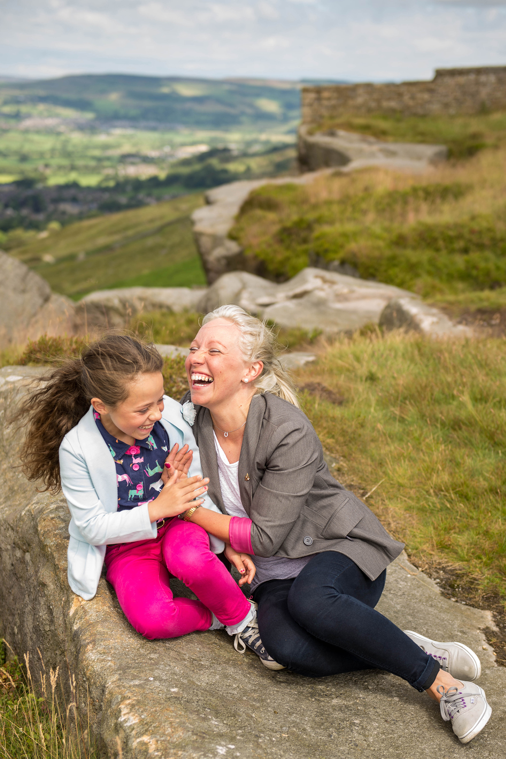 Mum and daughter laughing at cowling pinnacle