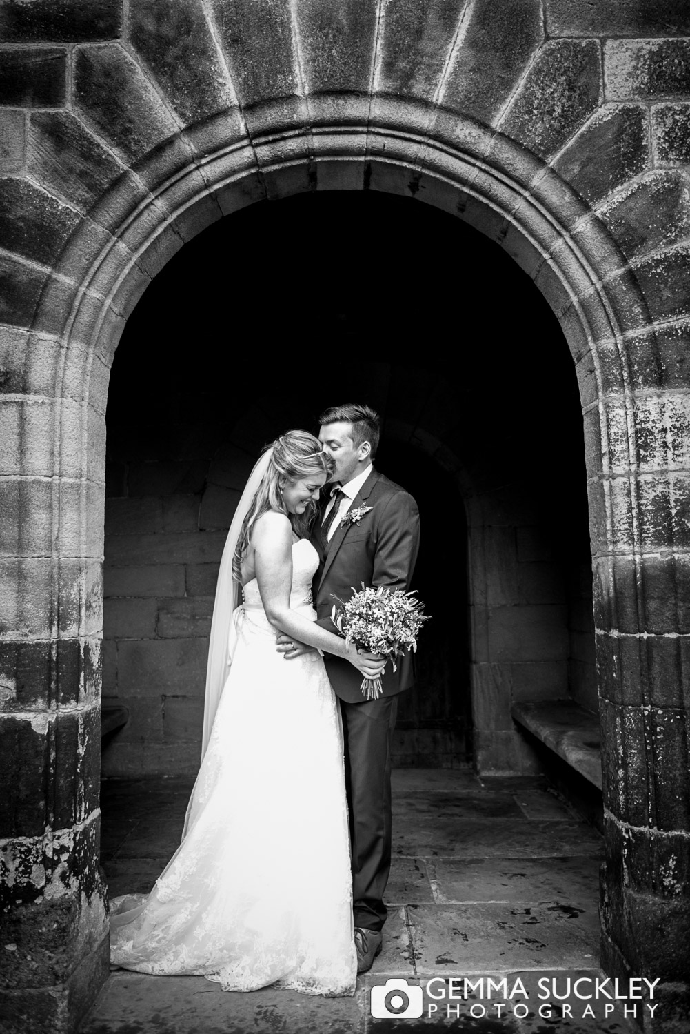 bride and groom at east riddlesden hall