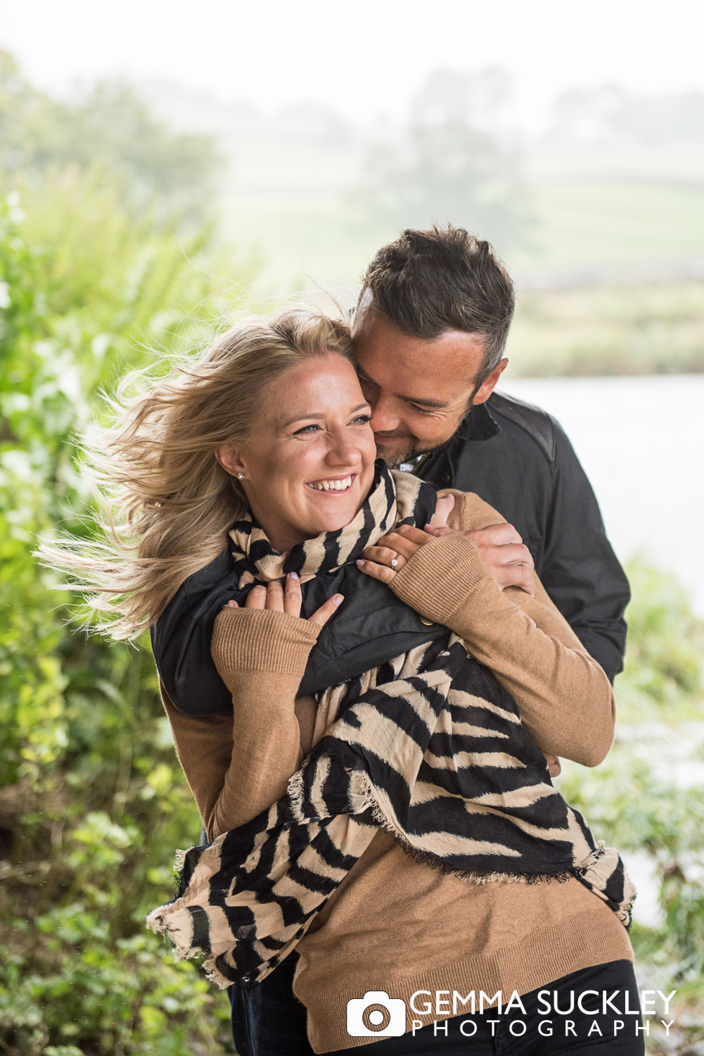 couple hugging during their pre-wedding shoot at the devonshire fell in burnsall