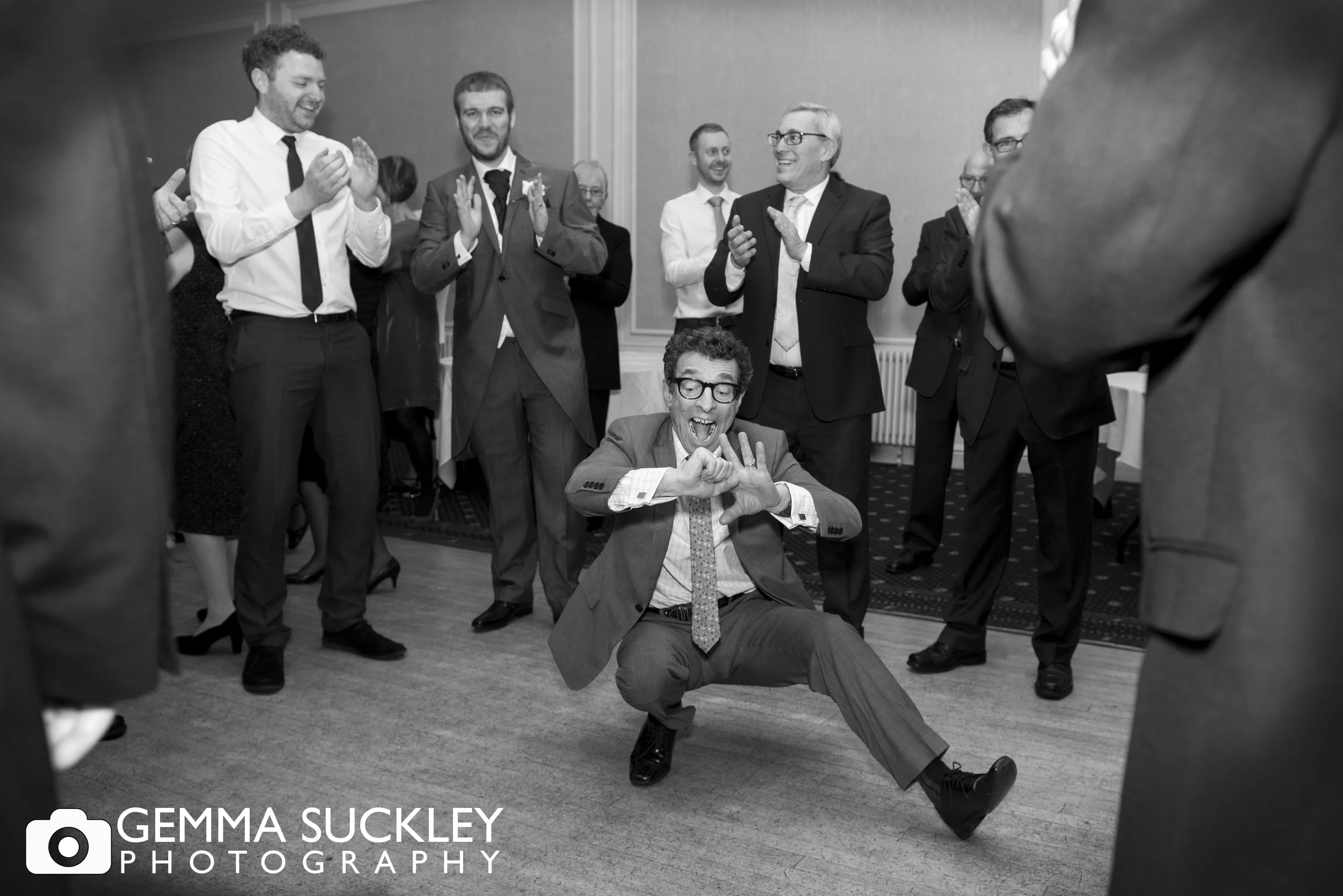 man dancing on the floor at a jewish wedding at the swan hotel in harrogate