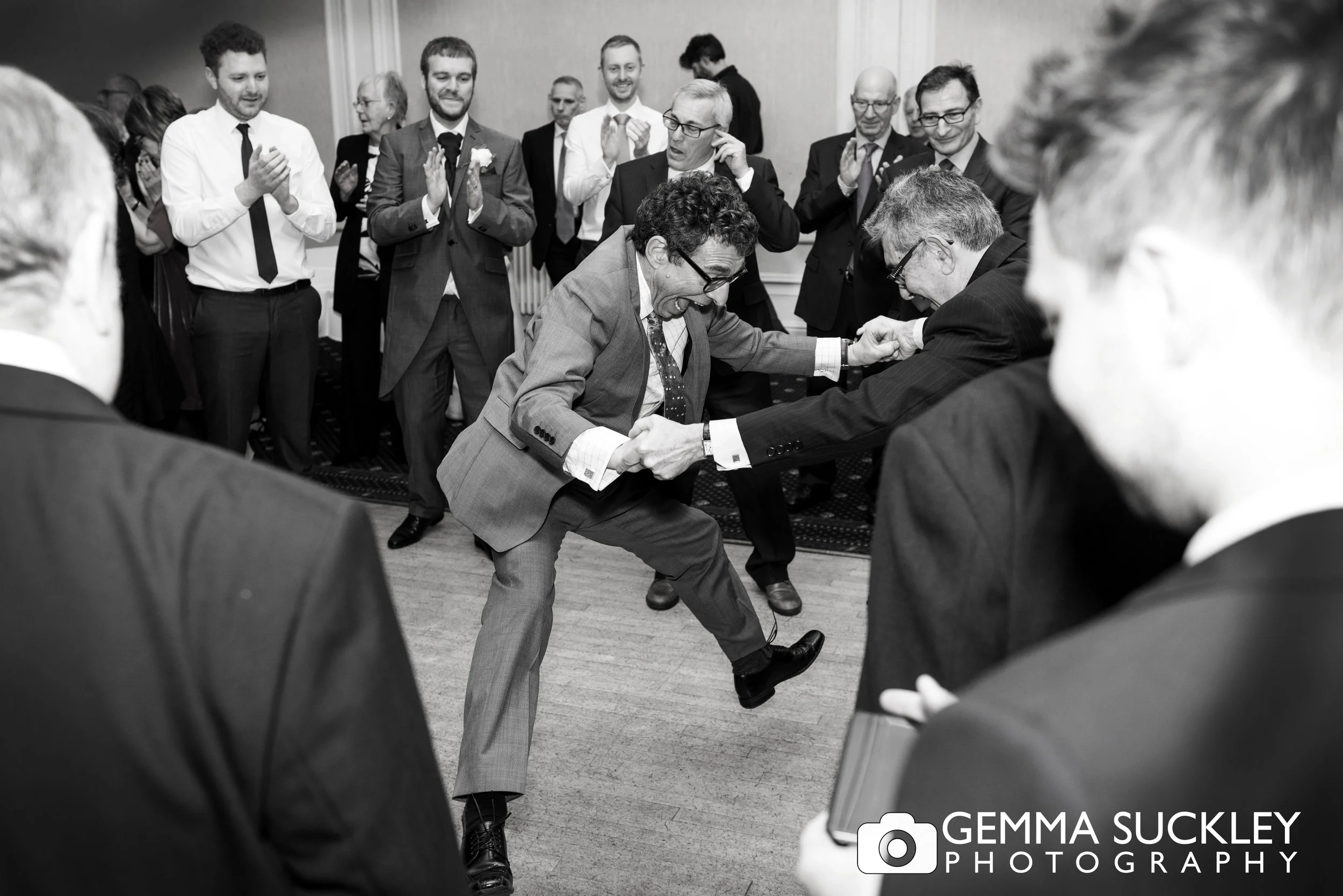 wedding guest dancing at a Jewish wedding at swan hotel in Harrogate