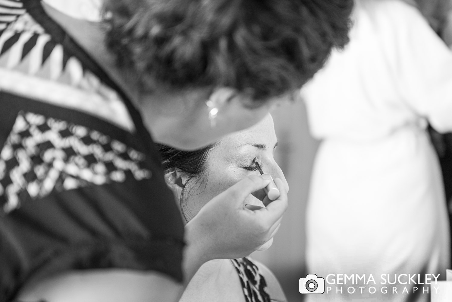 bride getting her make-up done