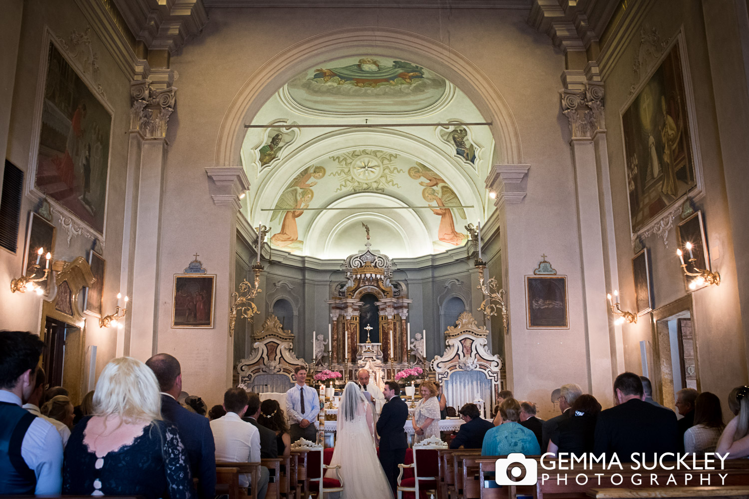 bride and groom from the back of the church 