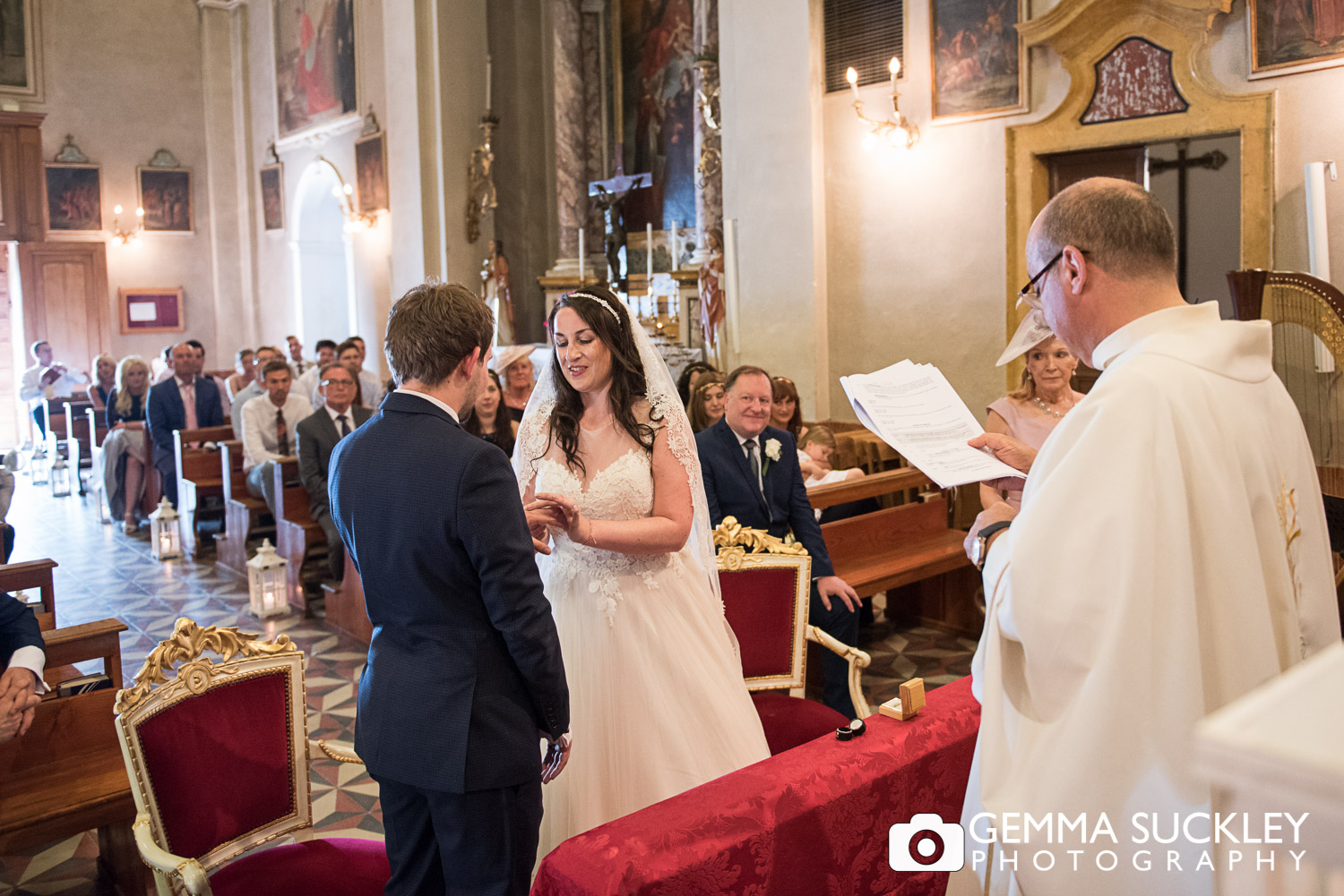 Yorkshire bride and groom exchanging rings, lake garda wedding