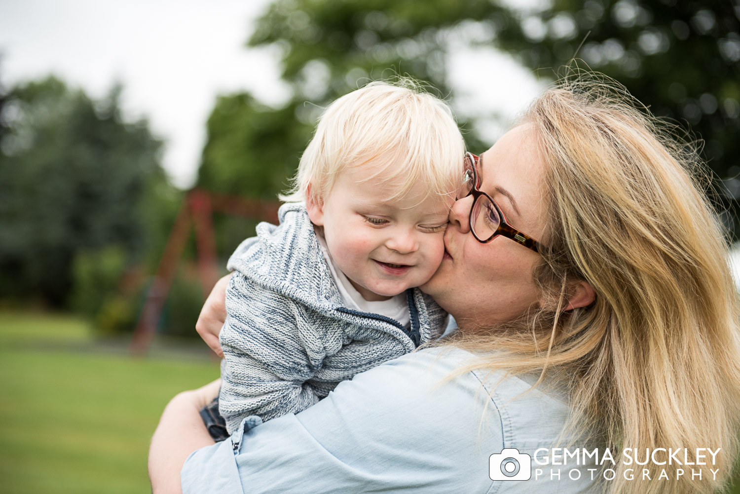 mum kissing her little boy during a photo shoot