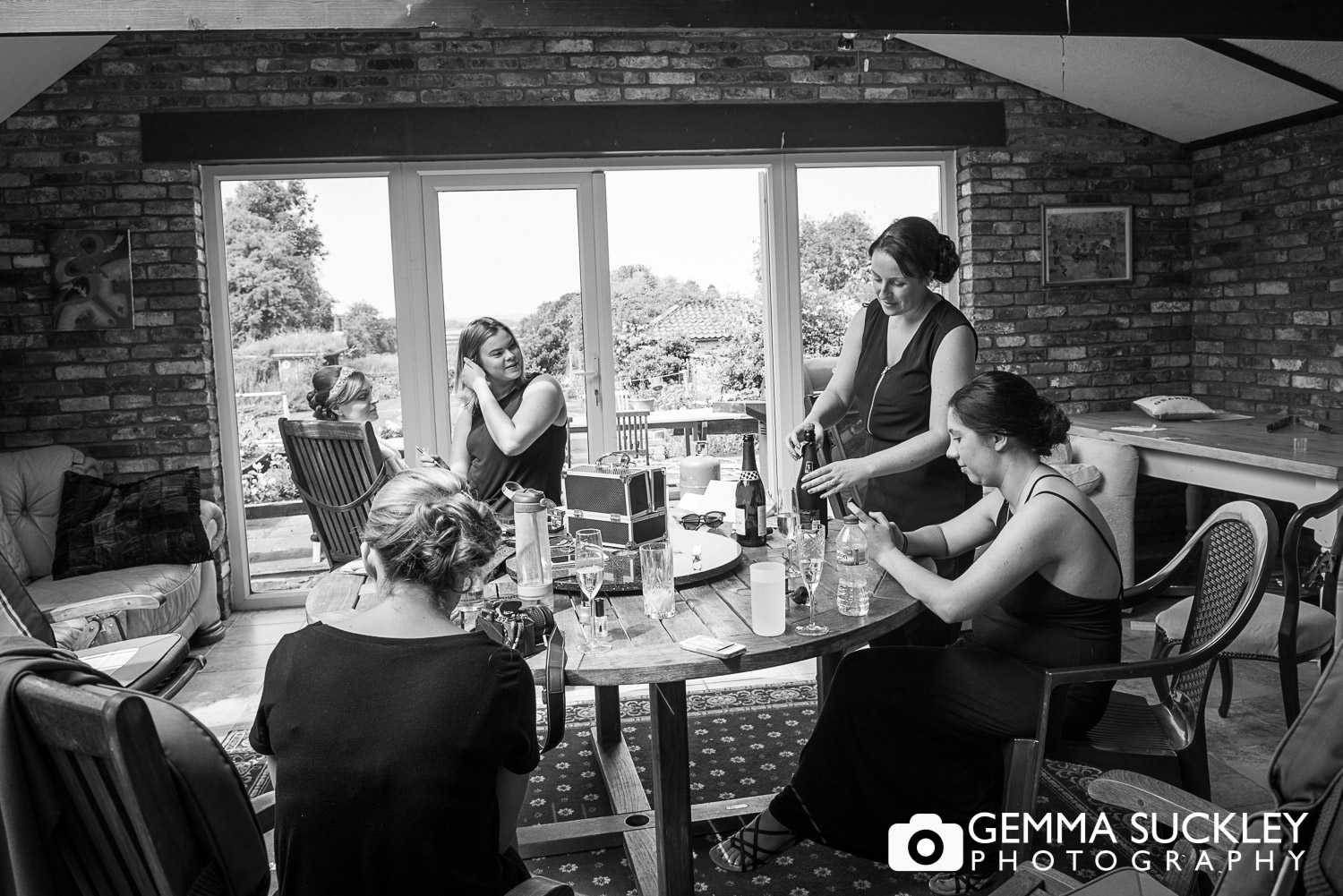 bridesmaids and bride getting ready for her wedding in Hutton