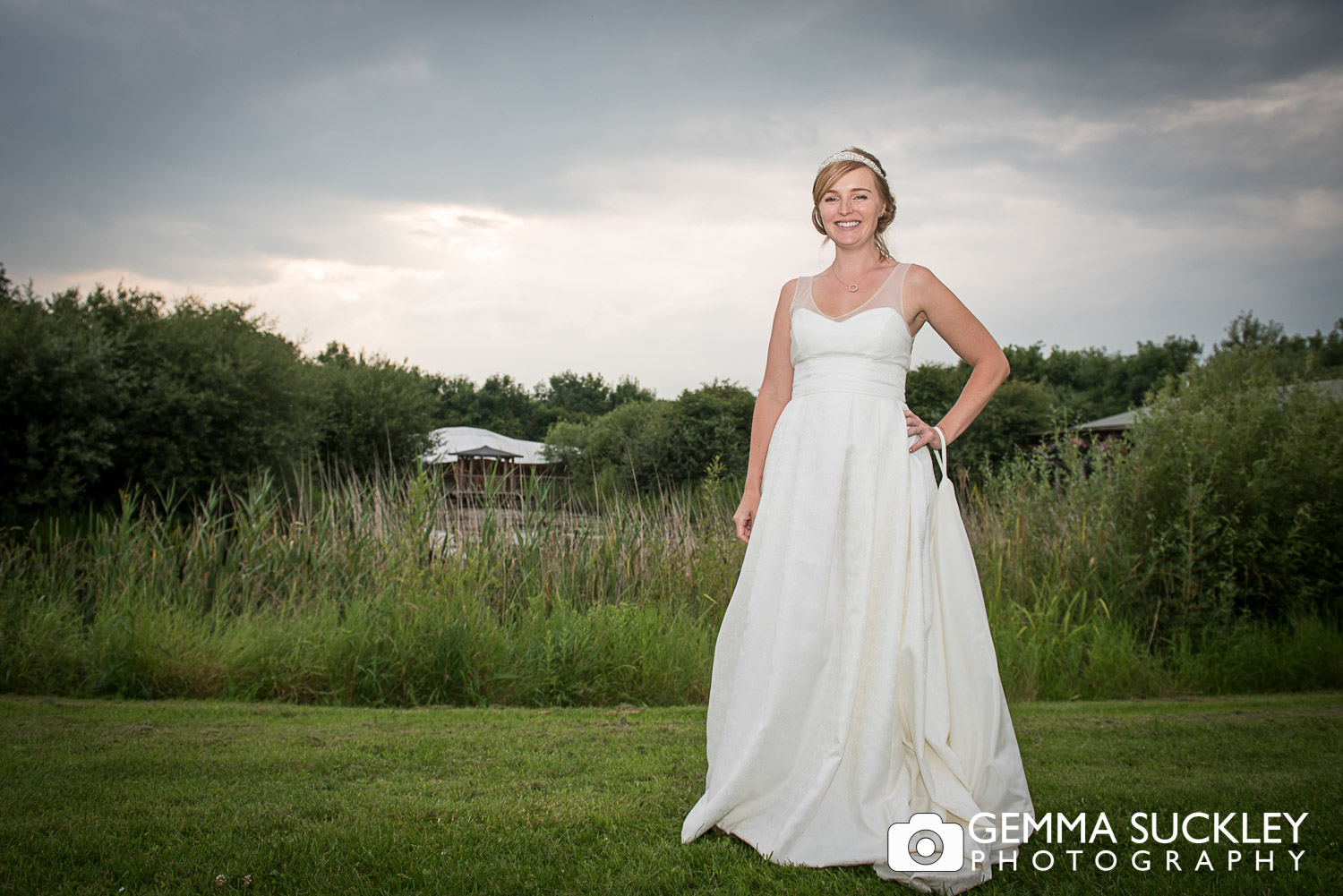 bride smiling as the sun sets at Oaklands in East Yorkshire