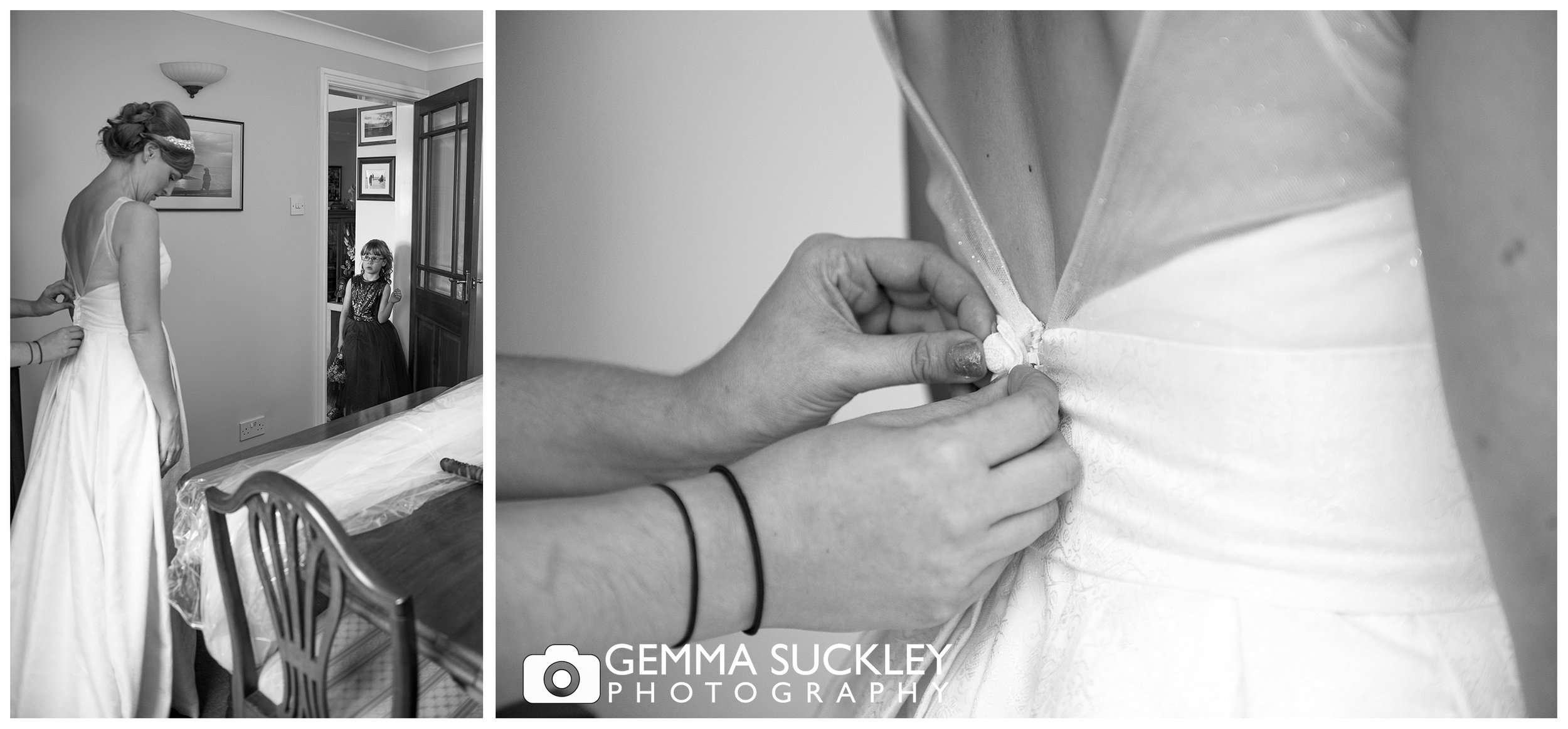 bridesmaid doing up brides dress in Driffield