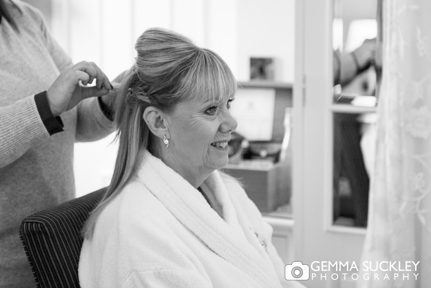 Bride getting her hair done at The Devonshire Arms, Bolton Abbey 