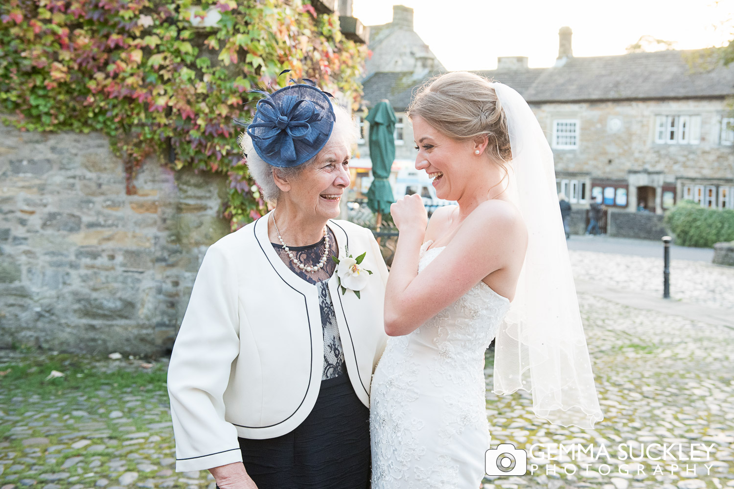 bride and her gran outside grassington house