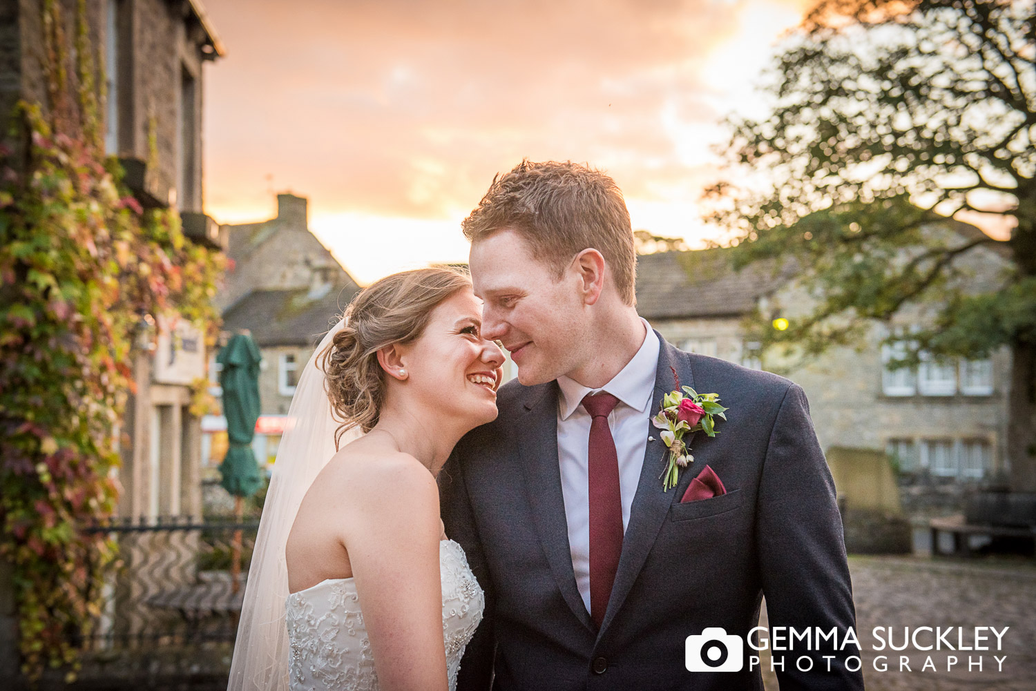 wedding photo of bride and groom at the sun sets in Grassington