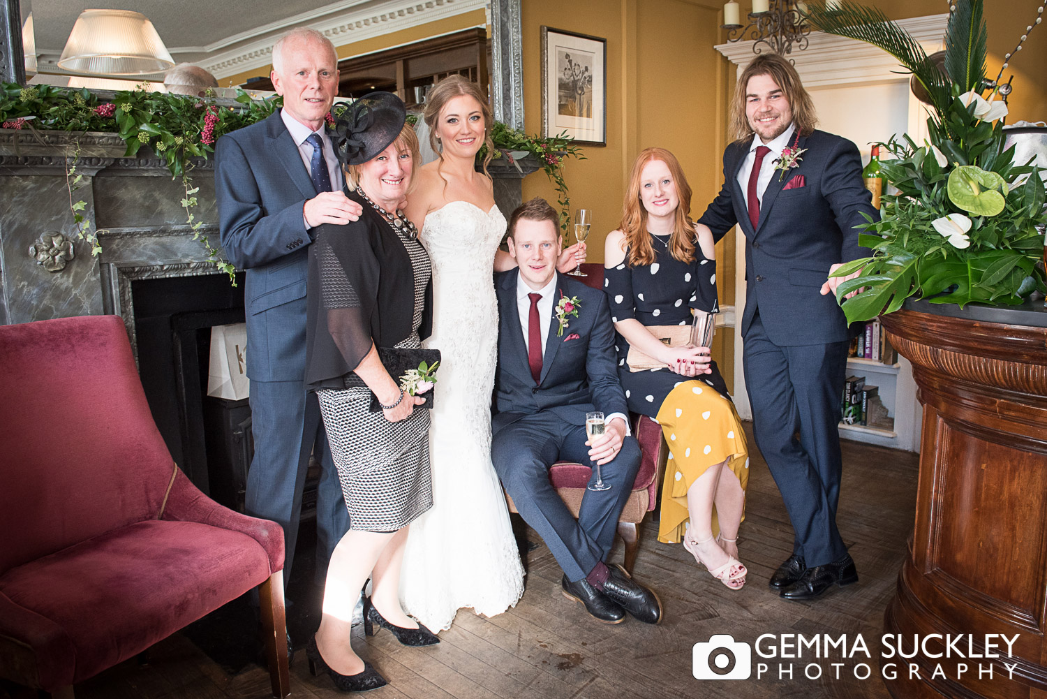 groom family formal photo in Grassington House