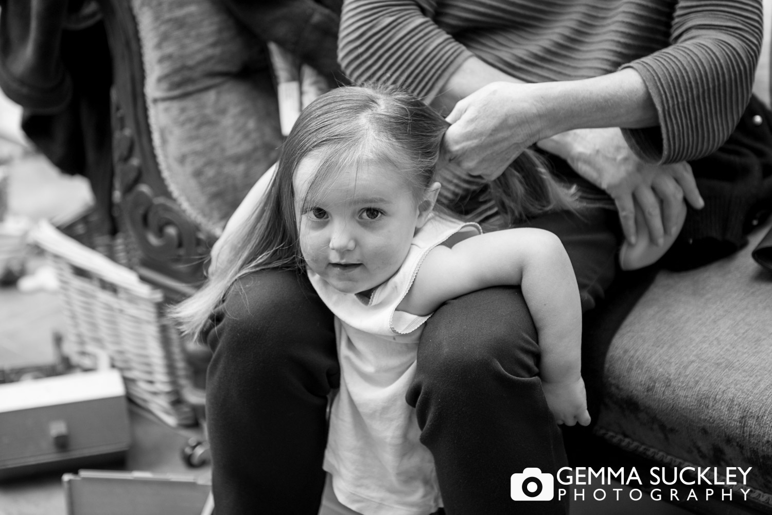 flower girl getting her hair done 