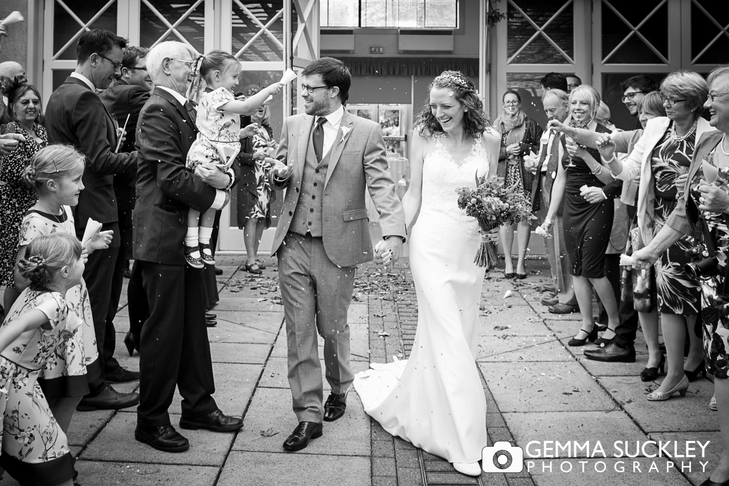 guests throwing confetti at Sun Pavilion, Harrogate wedding 