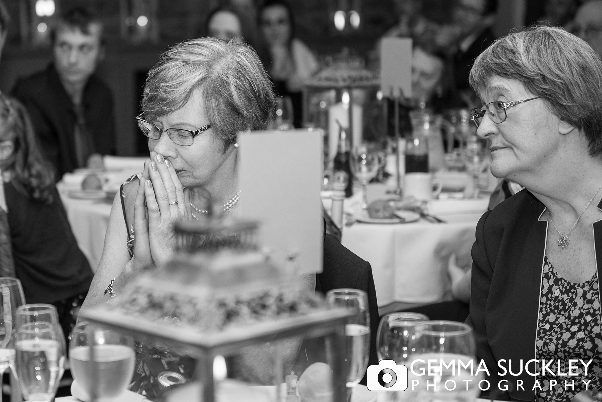 Guest crying at speeches, at Coniston hotel wedding