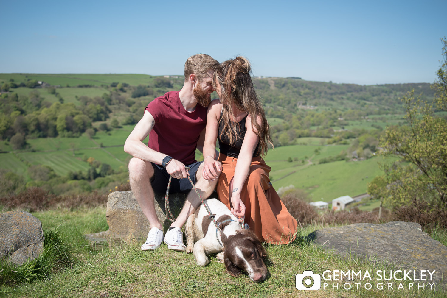 bride and groom with their dog during their engagement photo shoot in halifax