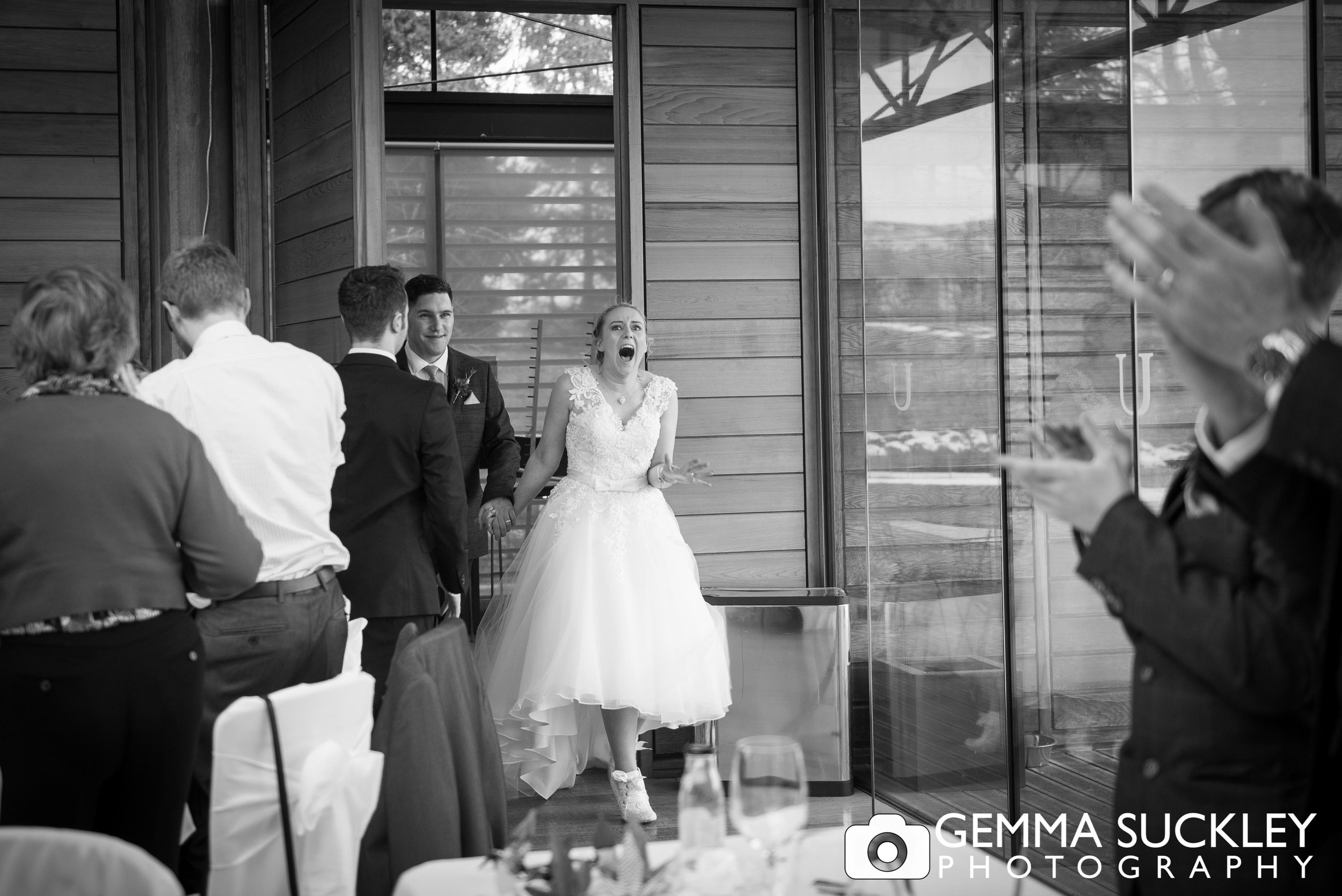 bride and groom making their entrance at utopia wedding