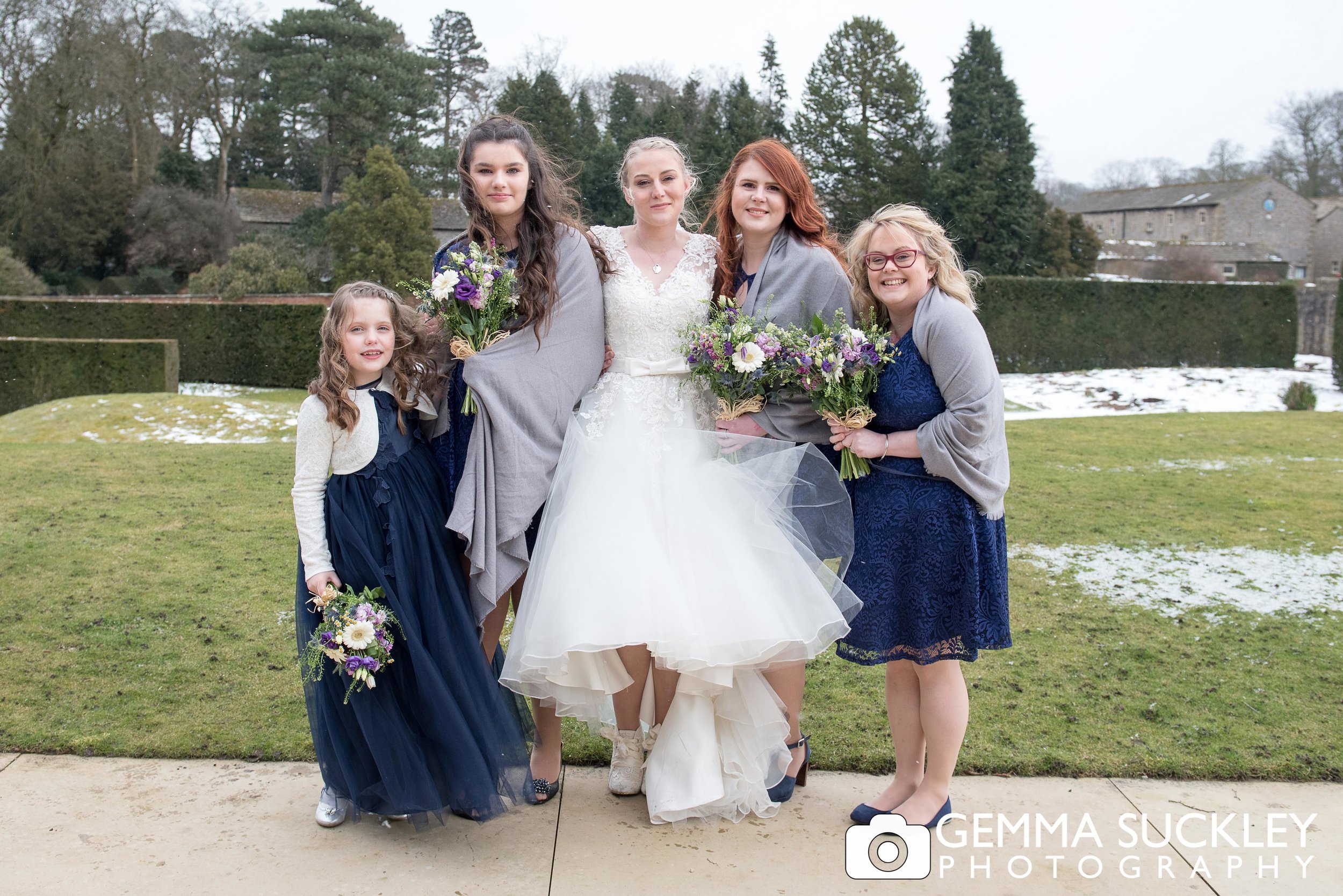 bride with bridesmaids at utopia wedding