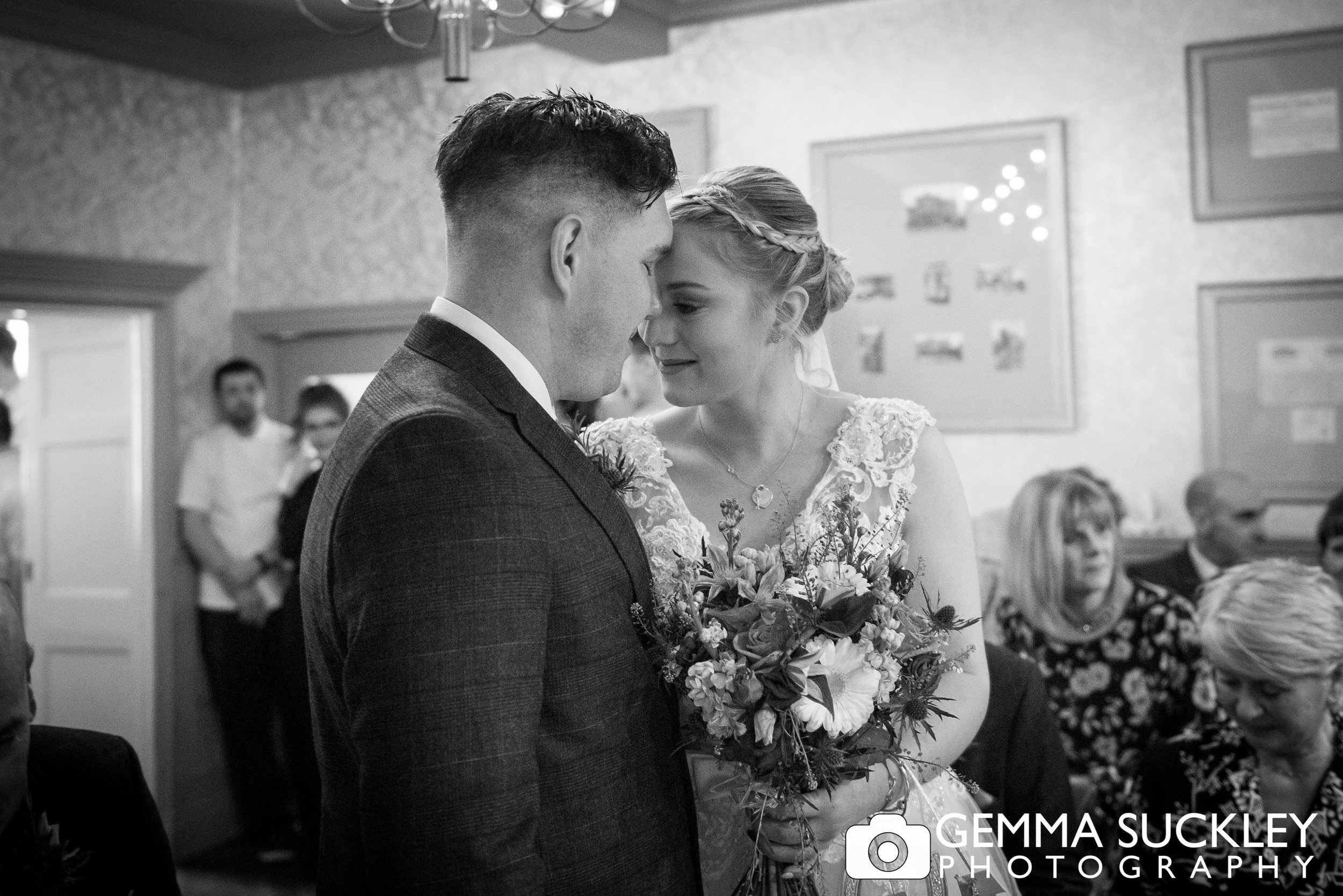 emotional photo of bride and groom during grassington house wedding ceremony